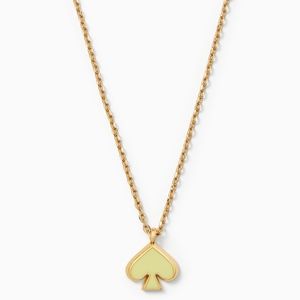 Kate Spade gold necklace with yellow Spade